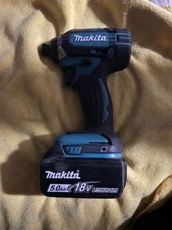 Makita drill and battery
