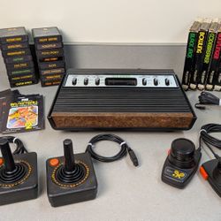 Atari 2600 video game system bundle 🕹️ console,  joysticks, paddles, 20 games
