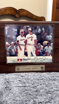 Autographed picture of Cal Ripken and Son