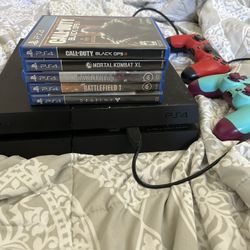 PS4 w/ 2 Controllers + 5 Games – Works Great