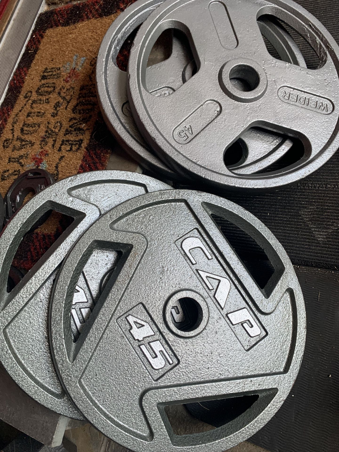 4x45 Lbs Olympic Weights Plates $75/ Pair