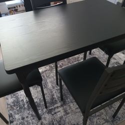 Table And 4 Chairs 