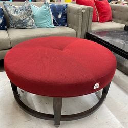 Crate & Barrel Ainsley Round Red Cocktail Ottoman on Wheels