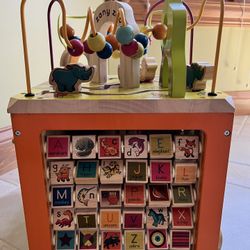 B. Toys Wooden Zany Zoo Activity Table