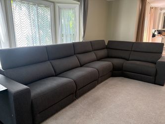Macy’s 5 piece Nevio fabric power headrest sectional