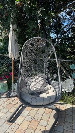 Grey egg chair with stand