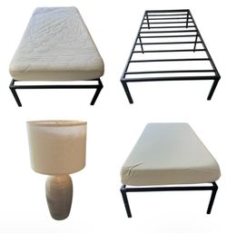 Free table lamp w/purchase twin metal under storage bed frame $75, 10” memory mattress $75, fitted padded cover$10