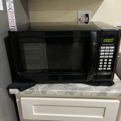 MICROWAVE  21"w x 14 3/4"deep x 12"high; cross streets are Arapaho & Waterview