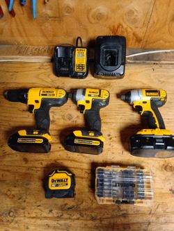 DeWalt drill & 2 impact wrench 3 batteries  2 chargers tape messenger & bits for the drill