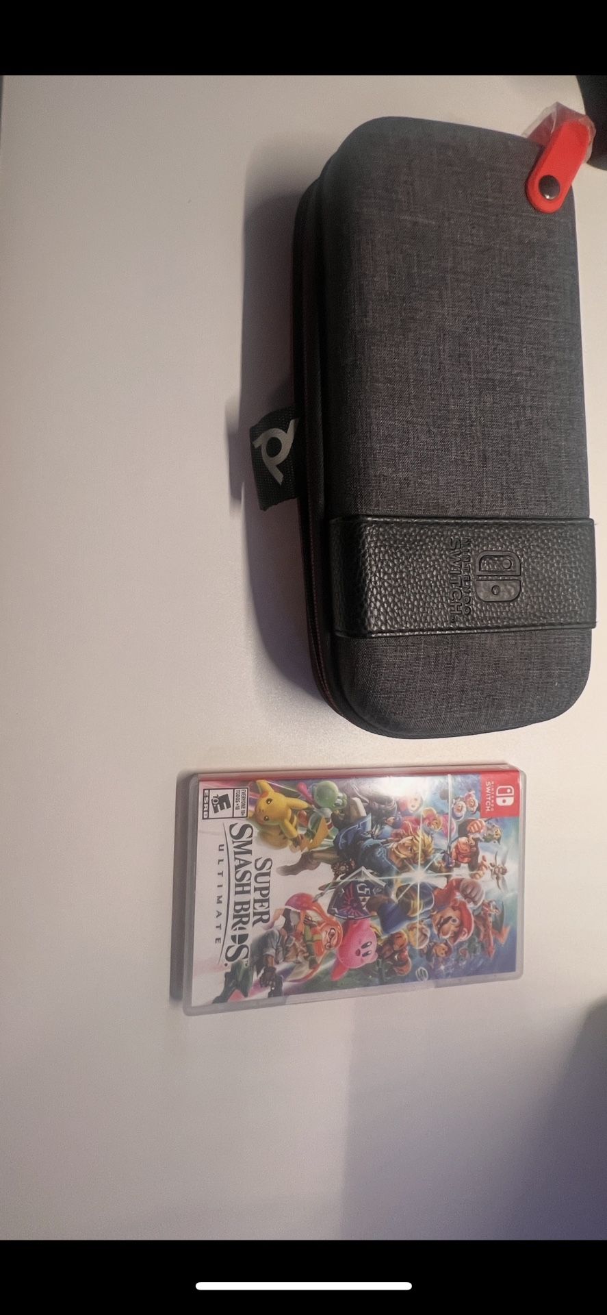 Nintendo Switch Lite Including Super Smash, Rubber Case w/ Charger