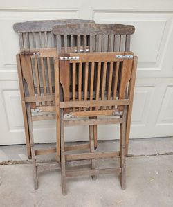 2 teak wood folding chairs
