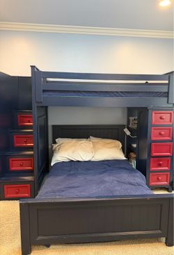 Bunk bed with drawers and bookshelf