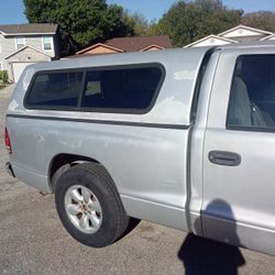 Silver  Camper Shell  Off A 2003 Dodge Dekota   It's 5ft  2inch Wide An 6ft  An  8in Long