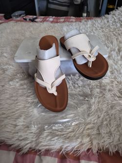 Biege slip on sandals