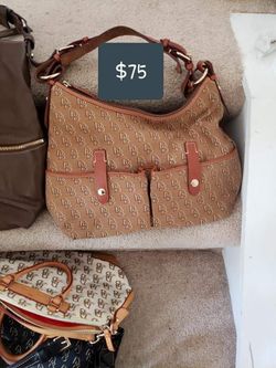 Gently used Dooney and Bourke Hand Bags