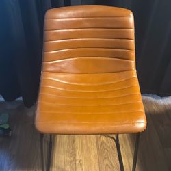 Brown leather bar stool