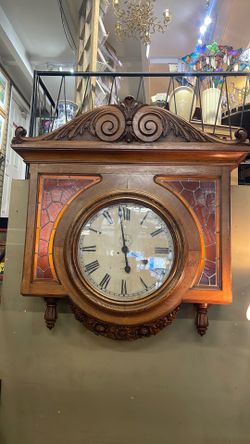 1900’s oak Ansonia 30 day wall clock with stained glass panels