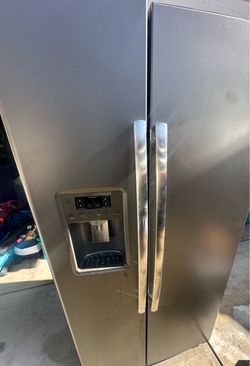 Free GE refrigerator.