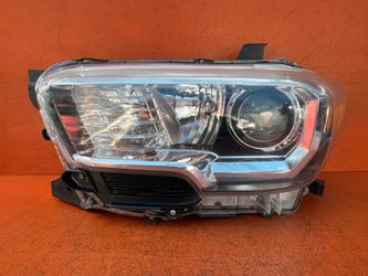 2016 - 2023 Toyota Tacoma Left Driver Side Base Halogen Headlight OEM