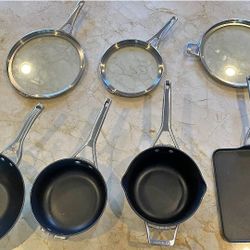 Like New 7 Pieces Calphalon Cookware Set .