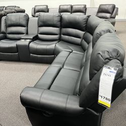 New Reclining Sectional .  Black Leather .  111” X 98”.  Free Delivery !