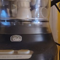 This is a Wolfgang Puck Bistro Collection Food Processor. 
Features a direct drive induction motor. 
Used for tasks like chopping, slicing, shredding,