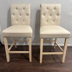 Two upholstered counter top stools 