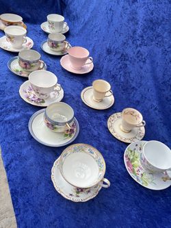 Teacup with plate, each set $5
