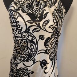 CHARLOTTE RUSSE' BLACK/CREAM HALTER TOP
SIZE LARGE 