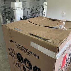 BRAND NEW STOVE AND FRIDGE IN THE BOX