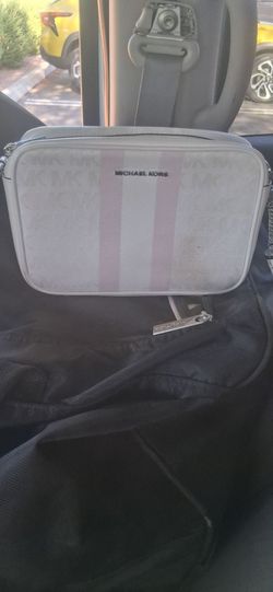 Three Michael kors handbags