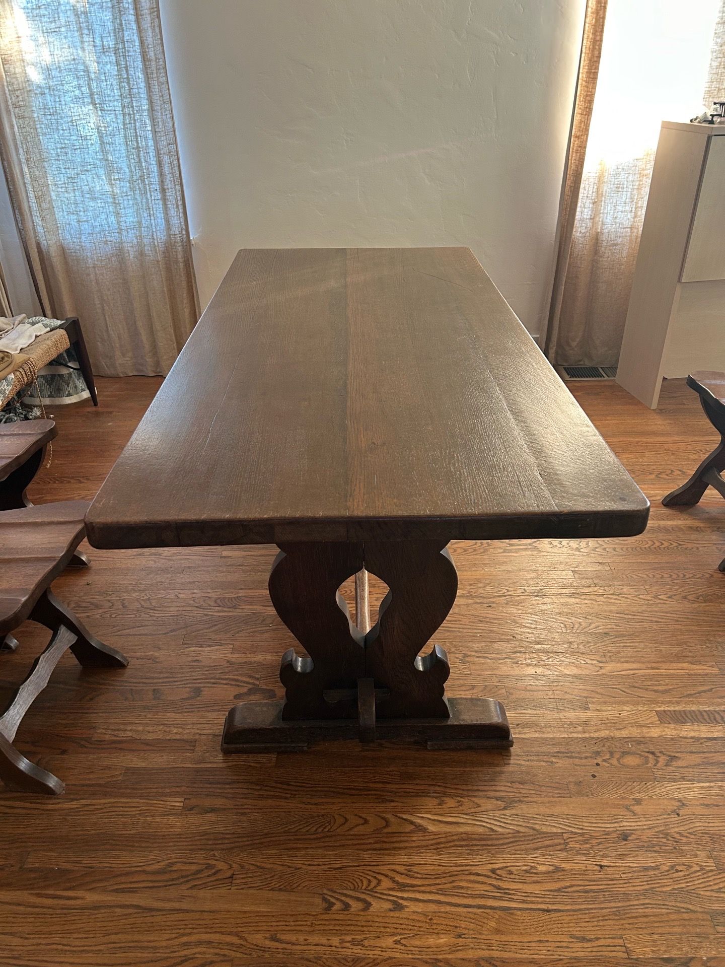 Antique trestle dining table with chalet style chairs