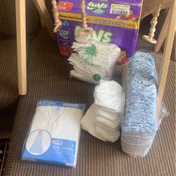 Baby Diapers And Playing Toy 20$