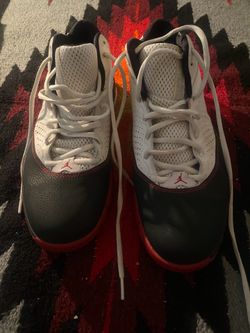 Air Jordan black/white/red basketball shoes size 10.5