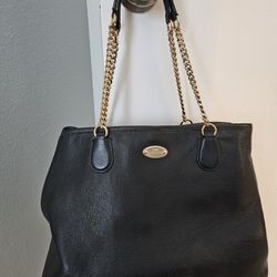 Black pebbled leather Coach tote.