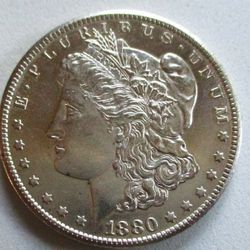 1880-CC MORGAN SILVER DOLLAR. UNCERTIFIED, UNCIRCULATED. BETTER GRADE.
