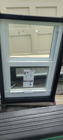 Exterior hurricane impact single hung salesman prototype window 19x29