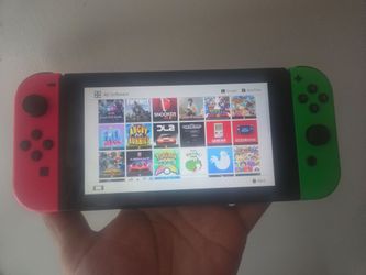 Nintendo switch v1 128 gb with games $180