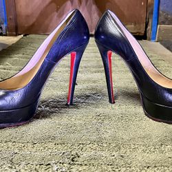 Black& Red Louboutin Pumps gently worn! Very Sexy!