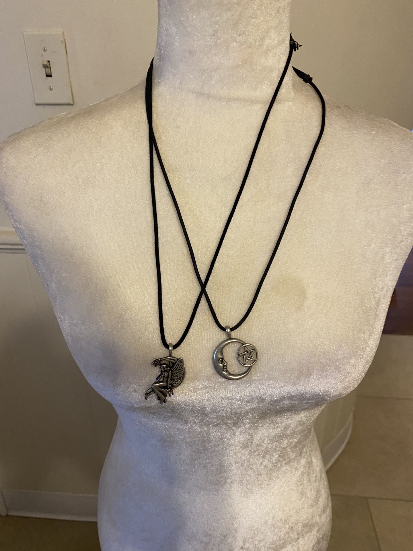 Two Stainless Necklaces On Black Adjustable Cord-$10.00 Each