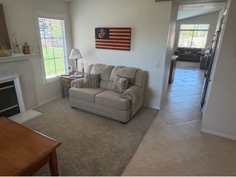 Living room couch and side tables.