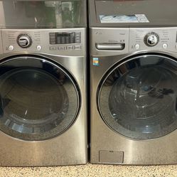 LG front-load washer and dryer set in a graphite steel finish.