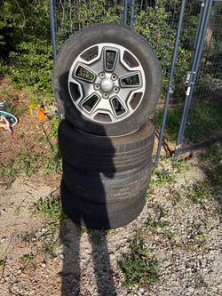 Jeep Wheels and Tires Set of 4 (wrangler stocks)