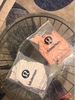 TWO two-piece Lululemon athletic set white size 6 pink size 4