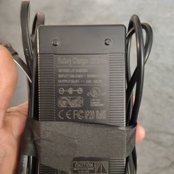 3 prong scooter or while charger 54.6v  2amp $10