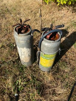 Vintage metal galvanized sprayers
