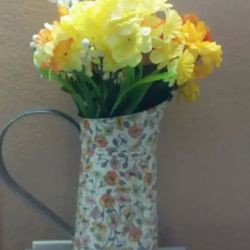 Tin pitcher home decor