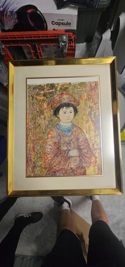 This is a framed limited edition reproduction titled "Michio" by artist Edna Hibel