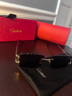 Cartier sun glasses gold frames tinted lenses