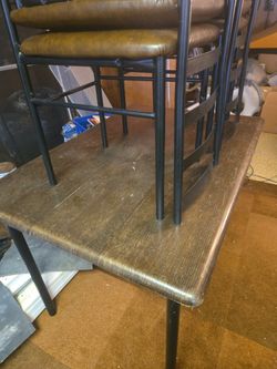 Table And 4 Chairs 